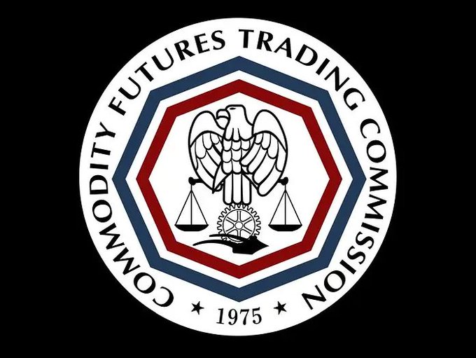 Circular seal for the Commodity Futures Trading Commission, showing an eagle, scales, a gear, and the text “COMMODITY FUTURES TRADING COMMISSION” with “1975” at the bottom.