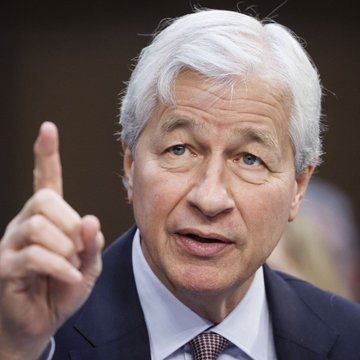 The image shows Jamie Dimon, CEO of JPMorgan, pointing upward while speaking, his expression animated. The accompanying post references JPMorgan in a bullish Bitcoin-related context, though Dimon has historically been a known skeptic of cryptocurrency, making the claim visually ironic given his longstanding critical public stance on Bitcoin.