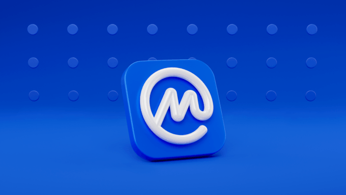 A 3D-rendered blue app icon with a white stylized 'M' or swirl logo on a blue background with dot pattern.