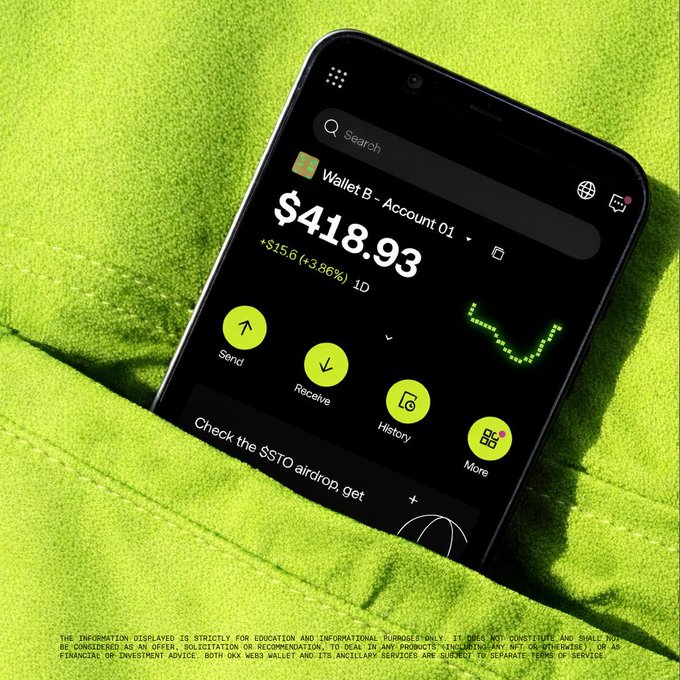 A smartphone displays the OKX Web3 Wallet interface on a green textured background, showing "Wallet B - Account 01" with a balance of "$418.93" and a daily gain of "+$15.6 (+3.86%)" alongside Send, Receive, History, and More options, plus a prompt to "Check the $STO airdrop." The image visually reinforces the post's message about mobile crypto finance by presenting a portable digital wallet that manages assets directly from a user's device, embodying the idea that money is no longer locked away in a vault but travels with you as a sleek, accessible app.