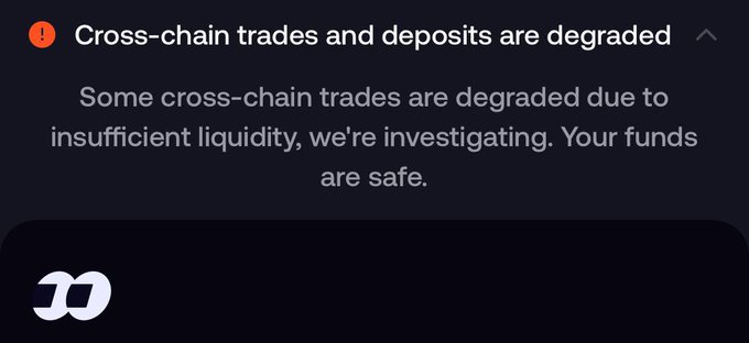 A notification from a cryptocurrency exchange (featuring the Wormhole logo) alerts users that "Cross-chain trades and deposits are degraded" due to insufficient liquidity, reassuring that "Your funds are safe." This relates to the post about FOMO being down, as the bridge/exchange platform is experiencing technical issues affecting cross-chain functionality.