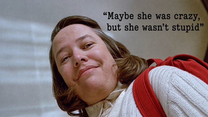 A still from a film showing a smiling woman with brown hair wearing a red vest over a cream sweater, with the quote 'Maybe she was crazy, but she wasn't stupid' displayed in the upper right corner.