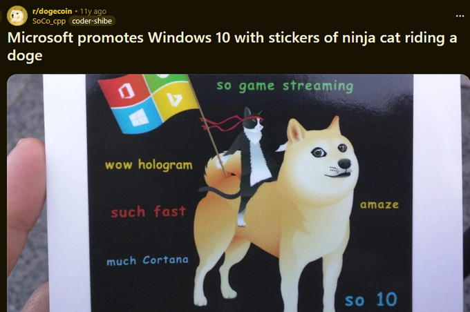 A Reddit post from r/dogecoin shares a vintage Windows 10 promotional sticker featuring the iconic "Ninja Cat" riding a Shiba Inu (Doge), with meme-style text including "so game streaming," "wow hologram," "such fast," "much Cortana," "amaze," and "so 10." The image relates to the post's claim that Microsoft promoted Ninja Cat as a cat version of Doge eleven years ago, with the post linking to a r/dogecoin discussion about this nostalgic crossover.