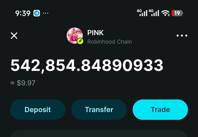 A Robinhood crypto wallet screenshot showing a balance of 542,854.84890933 PINK tokens (Robinhood Chain) valued at approximately $9.97, with Deposit, Transfer, and Trade buttons visible.