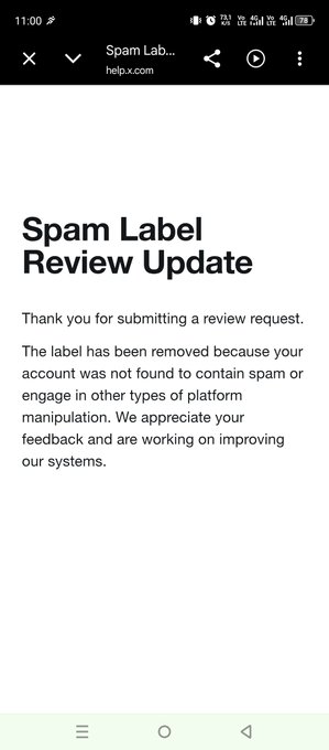 A mobile screenshot from help.x.com showing a 'Spam Label Review Update' message stating 'Thank you for submitting a review request. The label has been removed because your account was not found to contain spam or engage in other types of platform manipulation.'