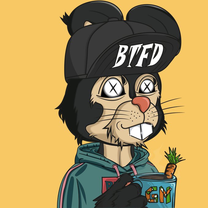 A stylized anthropomorphic rabbit wearing a black cap with "BTFD" (Buy The F***ing Dip) printed on it smiles while holding a mug, set against a yellow background — visually reinforcing the post's bullish sentiment about holding through Bitcoin's mild pullback to $77.10k after nearing $80k.