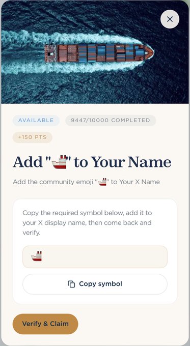 A mobile interface showing a reward for adding a ship emoji to a user name, currently 9447/10000 completed, with a button to copy the symbol.