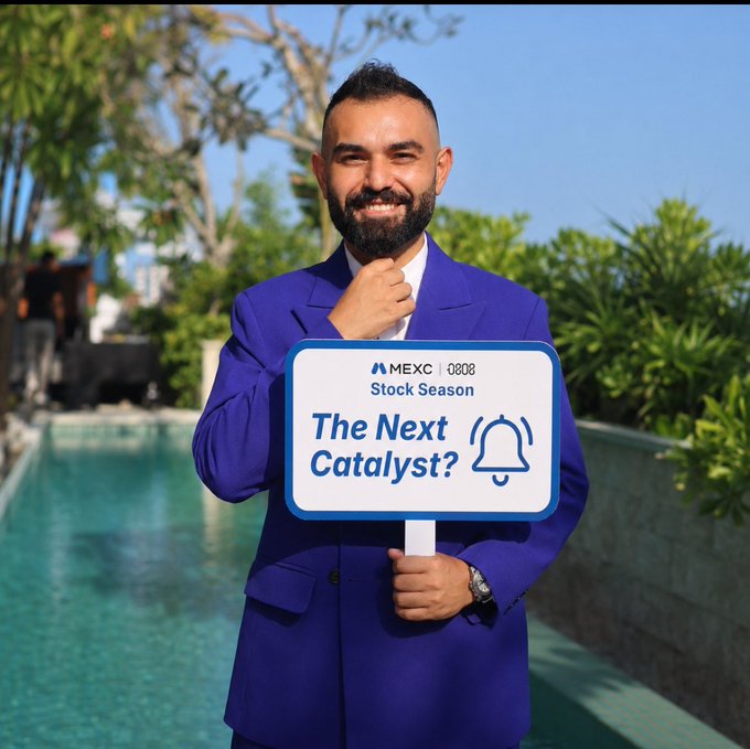 A smiling bearded man in a vibrant blue suit poses poolside while holding a sign reading "MEXC | 0808 Stock Season: The Next Catalyst?" with a bell icon, visually introducing MEXC's Pre-IPO product concept tied to upcoming stock market opportunities.