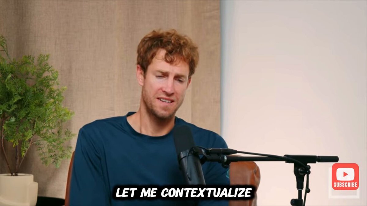 The image features a man sitting at a desk with a microphone attached to his shirt, suggesting that he might be hosting or participating in an interview or podcast recording session. The background of the image shows a white wall, which could indicate that they are in a studio setting. There is also a potted plant visible on the left side of the image.

The caption for this image reads: "ALERT: SUI WAS QUANTUM READY WAY BEFORE OTHER BLOCKCHAIN SAM BLACKSHEAR, CREATOR OF THE MOVE PROGRAMMING LANGUAGE, SAYS SUI'S QUANTUM READINESS WASN'T A COINCIDENCE.". This statement is likely a reference to the quote attributed to the creator of the move programming language and the blockchain technology.