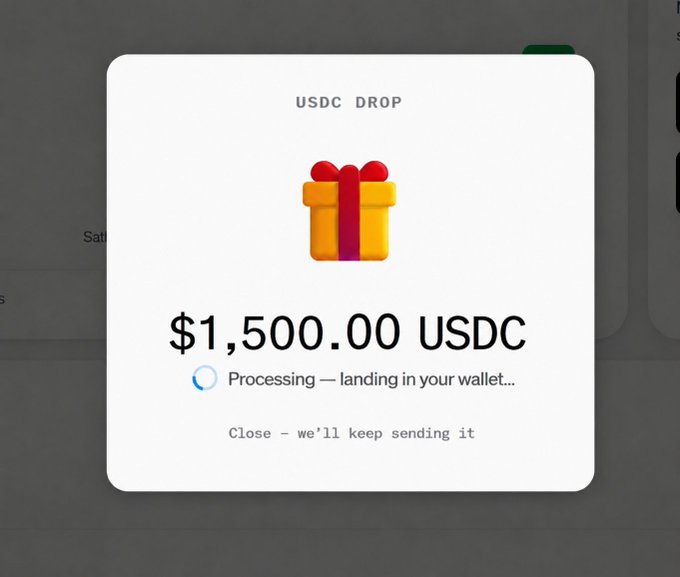 A digital wallet notification for a 'USDC DROP' of $1,500.00 USDC with a gift box icon, displaying 'Processing — landing in your wallet...' status.