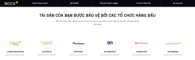 A Vietnamese SCCX website header displaying the text 'TÀI SẢN CỦA BẠN ĐƯỢC BẢO VỆ BỞI CÁC TỔ CHỨC HÀNG ĐẦU' (Your assets are protected by leading organizations), with logos of partner companies including LPBank Securities, Thao Group, Remitano, GFI Research, Chainalysis, and Sacombank.