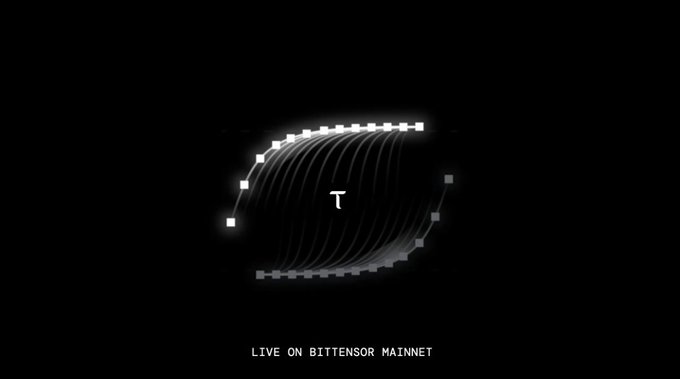 A minimalist black screen with a glowing white abstract cube/chain graphic featuring a 'T' symbol, with the text 'LIVE ON BITTENSOR MAINNET' at the bottom.