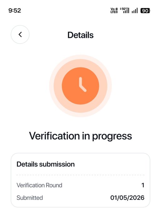 A mobile app screenshot showing a "Details" page with a clock icon and the message "Verification in progress," indicating that a Level 1 review submission is still being processed, with "Verification Round 1" and a "Submitted" date of 01/05/2026 visible below—illustrating the wait time mentioned in the post.