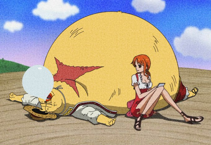 An anime-style illustration showing a blonde character with a straw hat lying on the ground next to a large yellow spherical object with a red mark, while a woman with orange hair in a red dress sits nearby holding a card.