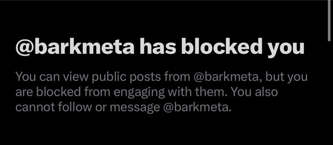 A screenshot of an Instagram notification stating '@barkmeta has blocked you', explaining that the user is blocked from engaging with or messaging the account.