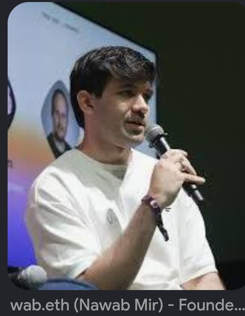 A man in a white t-shirt speaks into a microphone, with the caption 'wab.eth (Nawab Mir) - Founde...' visible at the bottom.