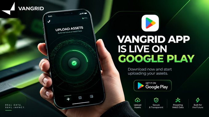 A promotional graphic announcing that the 'VANGRID APP IS LIVE ON GOOGLE PLAY', showing a hand holding a phone with the app's interface for uploading assets.