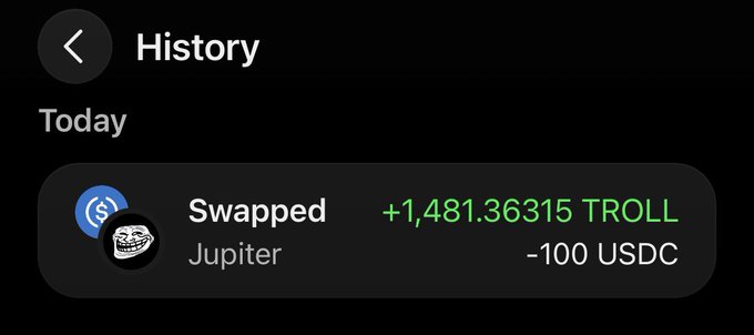 A crypto transaction history entry on Phantom wallet showing a swap on Jupiter of -100 USDC for +1,481.36315 TROLL.