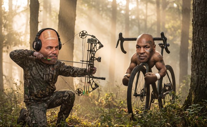 A humorous illustration depicting a hunter in camouflage with headphones aiming a compound bow at a cyclist, who appears to have Mike Tyson's face on his body, riding through a forest.