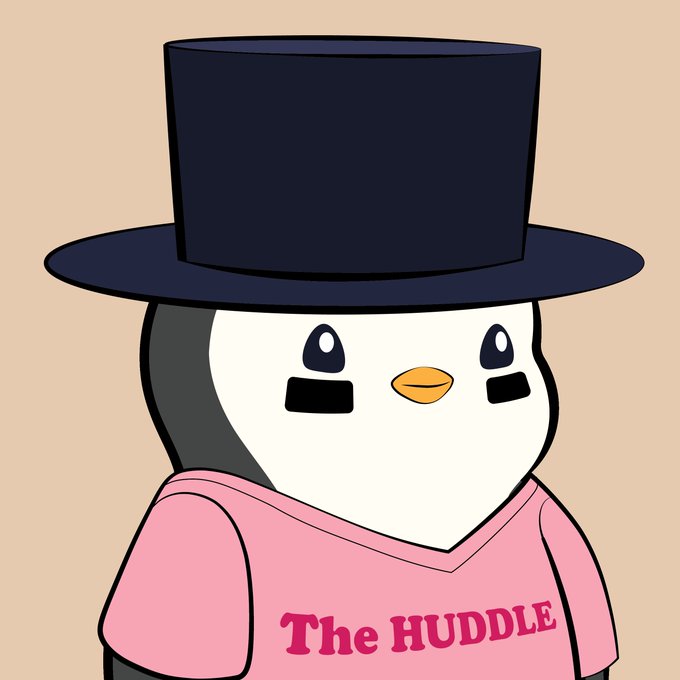 A cartoon penguin wearing a black top hat and a pink hoodie with 'The HUDDLE' text on it.