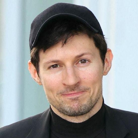 Pavel Durov, founder of Telegram, pictured wearing a black cap and dark blazer, smiling subtly at the camera. The image accompanies a post hyping his TON Blockchain project and the $GRAM token as an upcoming bull run catalyst.