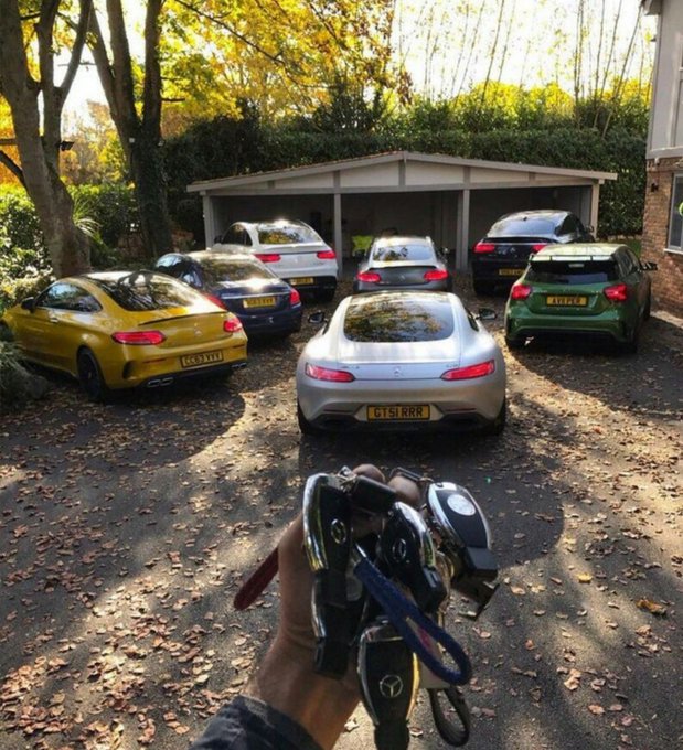 A hand extends a large bundle of car keys featuring Mercedes-Benz logos toward a collection of parked Mercedes-AMG cars, including a yellow AMG GT, silver AMG GT, green A-Class, and others parked in a leaf-strewn driveway, visually delivering on the "Sol guy and benz guy" declaration by showcasing the user's fleet of luxury German vehicles.

Visible license plates read "GT51 RRR" on the silver car and "RV16 YYY" on the yellow AMG GT.