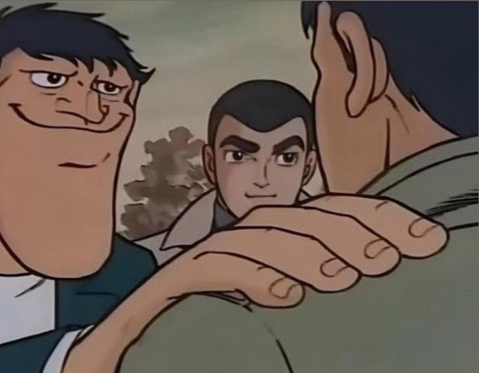 A screenshot from an animated cartoon showing three male characters, with one prominently smiling with a smirk while another looks on seriously in the background.