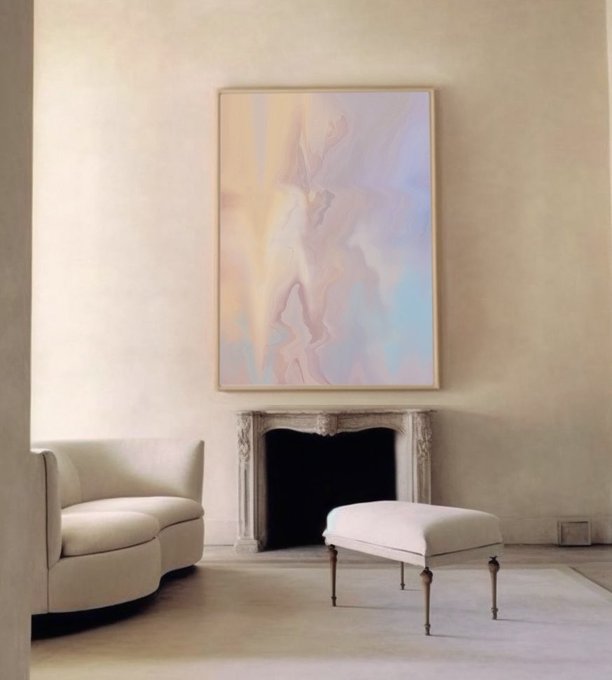 A minimalist living room features a cream sofa, an ornate white fireplace, and a large abstract painting with pastel pink, blue, and beige swirls hanging above it.