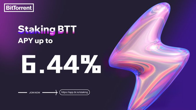 A promotional graphic for BitTorrent featuring an iridescent 3D object on a dark purple background, advertising BTT staking with an APY up to 6.44% and directing users to join at https://app.bt.io/staking. The image reinforces the post's message about $BTT staking rewards on the BTTC platform.