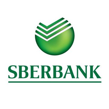 The image displays the green Sberbank logo featuring a stylized circular emblem above the "SBERBANK" wordmark, representing Russia's largest bank as it prepares to accept Bitcoin, Ethereum, and USDT as loan collateral under new crypto regulations.