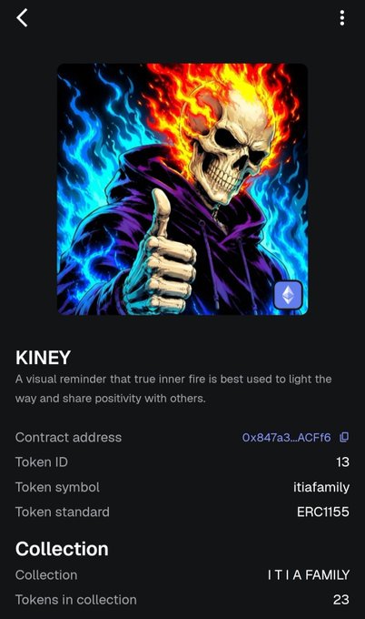 The image shows an NFT titled "KINEY" featuring a flaming skull in a purple hooded cloak giving a thumbs up, surrounded by blue flames. The post celebrates the ITIA Family collection going on-chain, with this token (#13 of 23 in the collection) representing the launch on OpenSea.