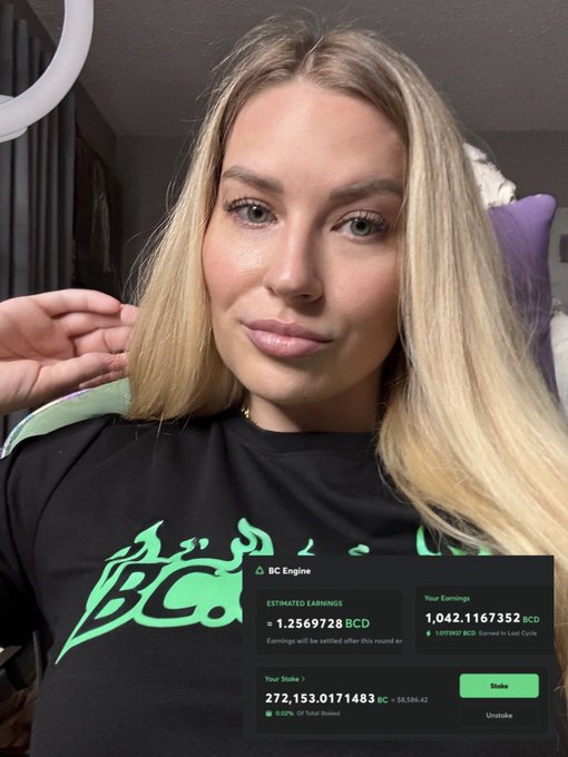 A selfie of a blonde woman wearing a black shirt, with an overlay showing "BC Engine" staking dashboard displaying earnings of 1.042.1167352 BCD and a stake of 272,153.0171483 BC worth $8,598.42.