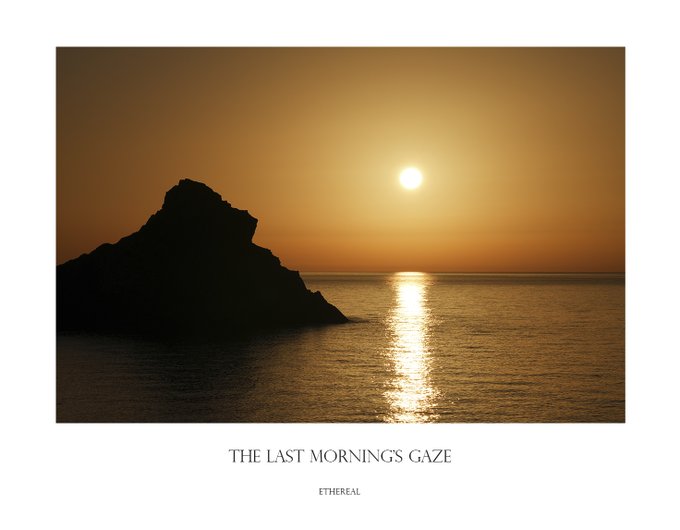 A serene seascape at sunset features the silhouetted form of a rocky island against a glowing golden-orange sky, with the sun's reflection shimmering across the calm water. Below the image, elegant text reads "THE LAST MORNING'S GAZE" with "ETHEREAL" beneath it, evoking the contemplative, wistful mood of the accompanying post about a piece of work still waiting to find its rightful owner.