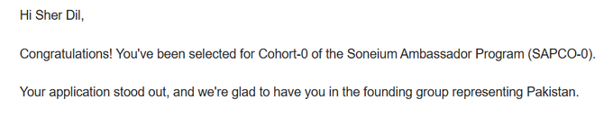 Text screenshot congratulating Sher Dil for being selected for Cohort-0 of the Soneium Ambassador Program (SAPCO-0), noting the application stood out and the participant is representing Pakistan.
