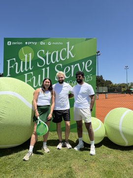 Zerion, Privy, and Matcha host a "Full Stack Full Serve" tennis event, featuring three people posing with oversized tennis balls in front of a green branded backdrop, tying into the company's 10-year anniversary celebration and its evolution from a 2016 smart contract platform to powering major crypto apps like Coinbase and Kraken today.