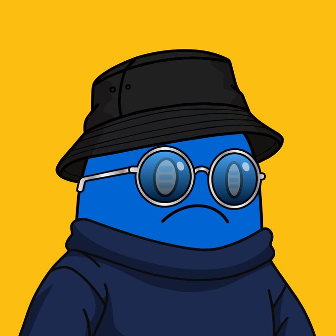 Cartoon illustration of a blue block-like character wearing a black bucket hat, round sunglasses, and a navy hoodie against a yellow background, with a downturned mouth.