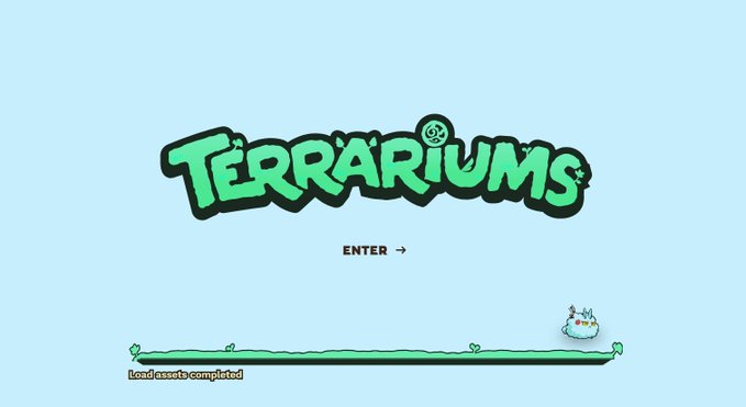 The image shows the title screen for "Terrariums," displayed in bold green bubble letters against a light blue background, with an "ENTER →" prompt and a "Load assets completed" message at the bottom alongside a small character on a green platform. This serves as the launch/welcome screen for the Terrariums V1 feature mentioned in the post, which is a new addition to Axie Infinity's land gameplay that allows players to activate and engage with their plots in new ways.
