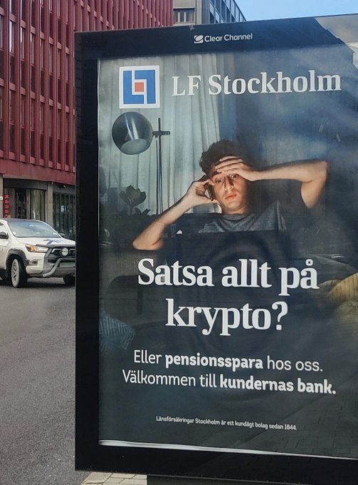 A Swedish billboard advertisement for LF Stockholm bank reads "Satsa allt på krypto? Eller pensionsspara hos oss. Välkommen till kundernas bank." featuring a young man looking stressed with his hands on his head.