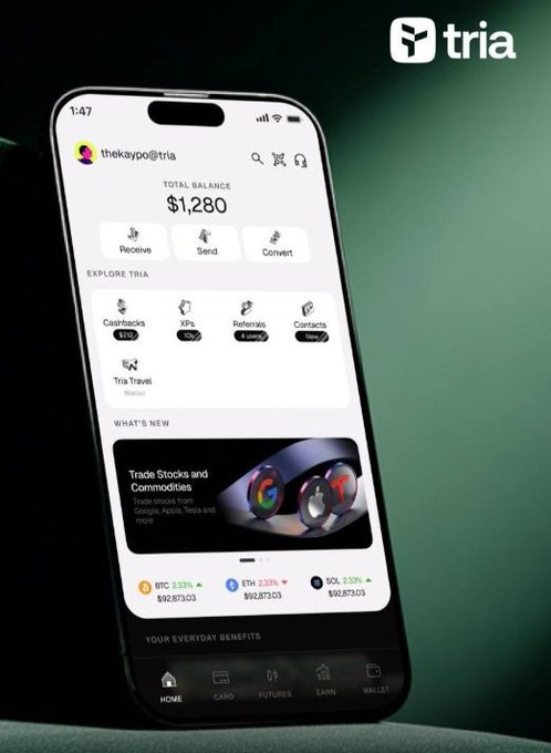 The image shows a smartphone with an app called "@useTria" displayed on its screen, which appears to be related to cryptocurrency or blockchain technology. The phone's background color is green, and there are two people visible in the image - one person standing behind the phone and another person sitting next to it. 

The post about @useTria emphasizes that the app should feel connected, not complicated, and that it aims to simplify the user experience by providing a seamless cross-chain access solution for users. The focus on less wallet management and easier onboarding suggests that the app is designed with the user's needs in mind, making it more accessible and user-friendly.
