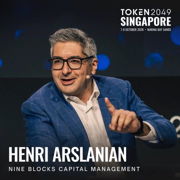 Henri Arslanian from Nine Blocks Capital Management speaks at TOKEN2049 Singapore, 7-8 October 2026 at Marina Bay Sands, gesturing while wearing glasses.
