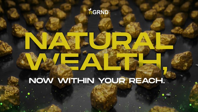 The image features a large pile of gold rocks, with the text "Natural Wealth" written above them. The phrase "now within your reach" is also present in the image. This suggests that the gold rocks symbolize wealth or financial success, and the image serves as an advertisement for a product or service related to natural wealth.