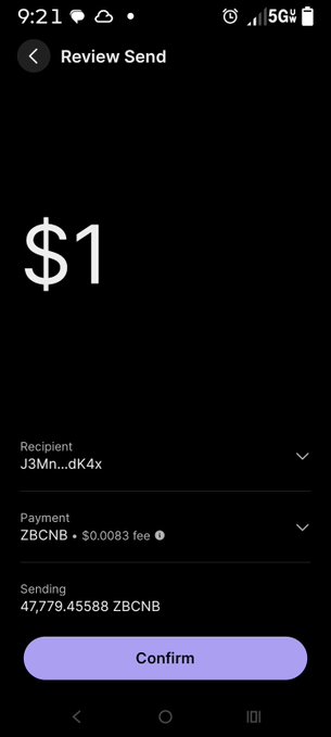 A dark crypto transaction screen shows “Review Send,” a $1 amount, recipient “J3Mn...dK4x,” payment “ZBCNB • $0.0083 fee,” sending “47,779.45588 ZBCNB,” and a purple “Confirm” button.