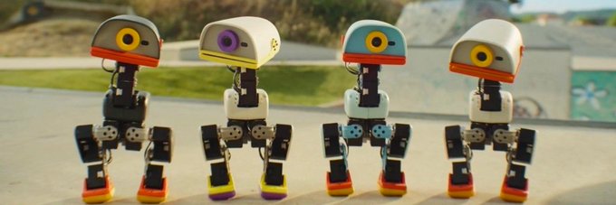 Four small, colorful robot figures with single circular "eye" heads stand in a row on a skateboard, with their banner image serving as a playful visual for the Robinhood token $microduck on Moby.