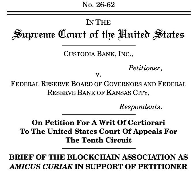The image shows the cover page of an amicus curiae brief filed by the Blockchain Association in support of Custodia Bank's petition for a writ of certiorari to the U.S. Supreme Court, in the case Custodia Bank, Inc. v. Federal Reserve Board of Governors and Federal Reserve Bank of Kansas City (No. 26-62). This relates directly to the accompanying post, which highlights the Blockchain Association's backing of Custodia Bank's Supreme Court bid for direct access to the Federal Reserve's payment system.