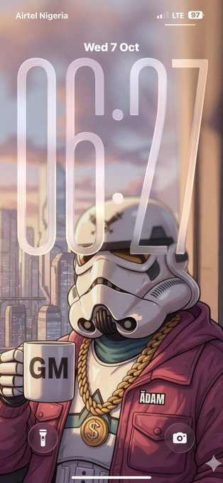 A phone lock screen displays the time '06.7' (06:07) on Wed 7 Oct over a wallpaper featuring a stylized stormtrooper-like character labeled 'ADAM' holding a 'GM' mug.
