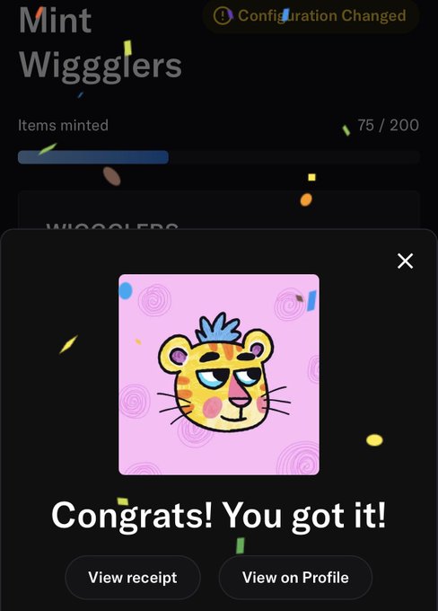 A screenshot of a digital minting interface titled 'Mint Wigglers' showing '75 / 200' items minted, with a popup message reading 'Congrats! You got it!' featuring a cartoon illustration of a yellow animal character with blue spiky hair on a pink background.