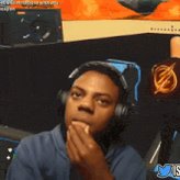 The image features a man wearing headphones, sitting down with his hand over his mouth as if he's about to make a funny face or say something humorous. The caption of the image reads "1 sol sent" and "bro", which suggests that this is likely a humorous or amusing situation involving the man in the blue shirt.

The post also mentions that there are two people sitting behind him, possibly friends or family members who are watching his reaction to whatever he's about to say or do next. The image seems to be related to a gaming event where participants often make funny faces and gestures while playing video games together for entertainment purposes.