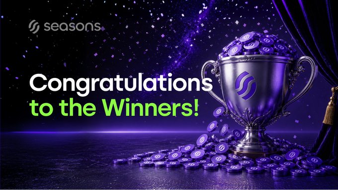 A promotional graphic celebrating giveaway winners for the "$SEAS" cryptocurrency, featuring a silver trophy overflowing with purple "$S" coins against a starry cosmic background, with the "Seasons" logo and text reading "Congratulations to the Winners!" — visually reinforcing the post's announcement of 25 new holders each winning 400 $SEAS tokens.