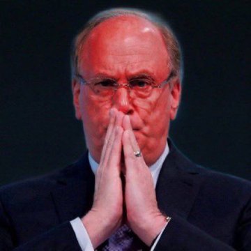 An older man in a suit with glasses holds his hands pressed together in a prayer-like gesture against a dark background, his expression suggesting concern or contemplation. The image visually complements the post about BlackRock's $53.6 million Bitcoin ETF sale, conveying a sense of worry or anxious anticipation about the market implications.