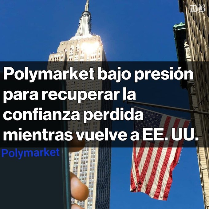 News headline over a photo of the Empire State Building and American flag reading 'Polymarket bajo presión para recuperar la confianza perdida mientras vuelve a EE. UU.' with 'Polymarket' tag.